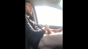 Hairy Guy having a Bat while Driving