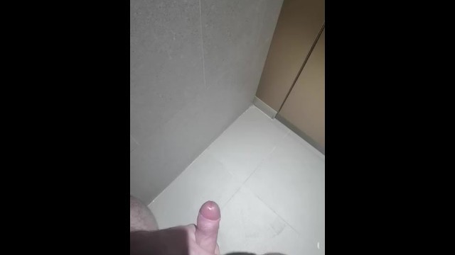 Massive Cumshot all over the Walls in the Gym