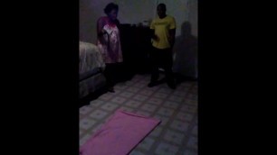 Lashunda gives Don a Hard Belt Spanking while he is Laying on the Floor